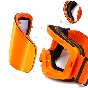 Detail view of the detachable orange ski goggles frame with magnetic lens and foam padding