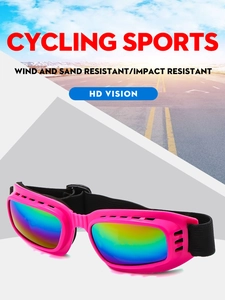 Detail view of pink cycling goggles with rainbow lenses and adjustable black strap