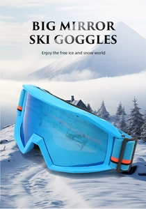 Big mirror ski goggles with blue reflective lens and adjustable strap over snow mountains