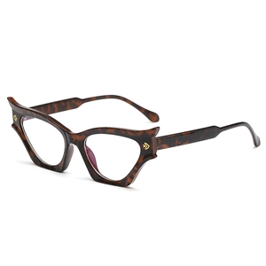 Chic cat-eye tortoiseshell sunglasses with gold metal accents and dark brown frames