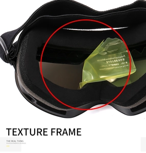 Detail of ski goggles frame showing high-density black sponge padding and protective lens film