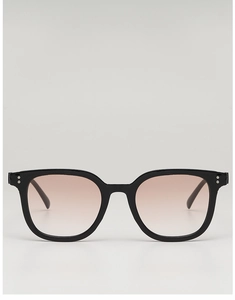 Front view of black square vintage sunglasses with silver rivet detail and gradient lenses