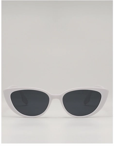 Front view of white cat eye sunglasses featuring dark lenses for a retro fashion look