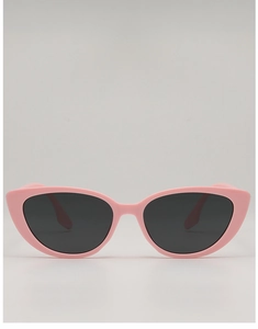 Detail view of pink vintage cat eye sunglasses featuring dark lenses and retro resin frames