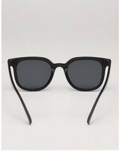 Detailed rear view of retro square black frames with dark sun lenses and silver studs