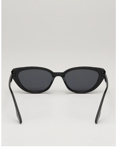 Detailed back view of vintage cat-eye sunglasses with black frame and dark lenses