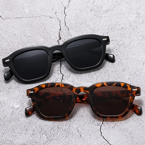 Classic square sunglasses in black and tortoise shell finish with silver metal accents