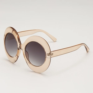 Retro oversized oval sunglasses with champagne frames and grey gradient lenses
