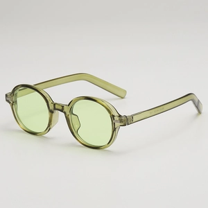 Retro oval olive green resin sunglasses with translucent frame and tinted lenses