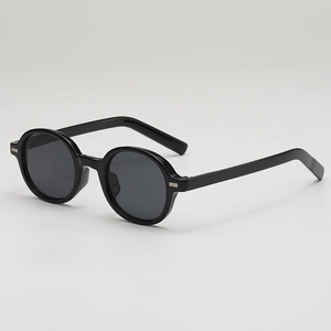 Retro oval black sunglasses with silver accents in a stylish 45-degree angle view