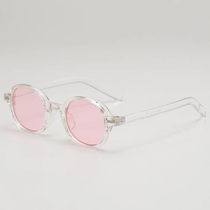 Retro oval sunglasses with transparent pink lenses and clear frames shown at a 45-degree angle