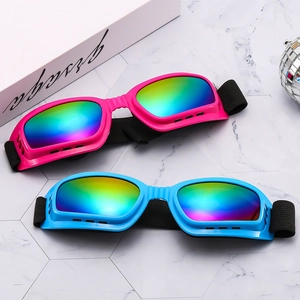 Colorful protective ski goggles in rose pink and sky blue with rainbow tinted lenses