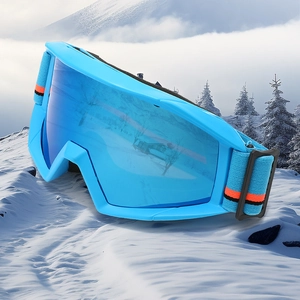 Sky blue anti-fog ski goggles with wide lens and orange-striped elastic strap outdoors