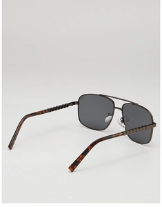 Detailed side view of pilot sunglasses with bronze metal frames and tortoiseshell temples