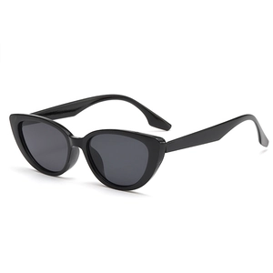 Vintage cat-eye sunglasses for women with thick black frames and dark polarized lenses