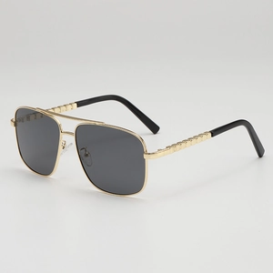 Classic gold metal aviator sunglasses with double bridge and textured temple detail
