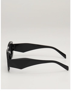Detail view of stylish black sunglasses with geometric wide temples and UV400 protection