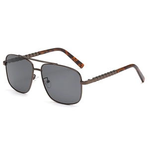 Classic pilot sunglasses with metal double bridge and gunmetal beaded temples on white background
