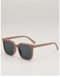 Detail of matte pink square kids sunglasses with silver star rivets and dark lenses