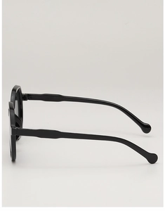 Side view of black full-frame sunglasses with glossy finish and ergonomic temple tips