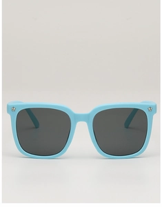 Close-up of sky blue square frame kids sunglasses with silver star studs and dark grey lenses