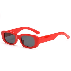 Retro red rectangle sunglasses for kids with dark lenses shown from a 45-degree angle