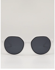 Detail of white polygon frame sunglasses with dark grey lenses in high-quality finish