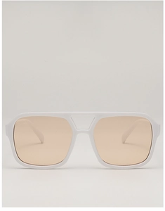 Front view of white oversized pilot sunglasses with peach tinted lenses and double bridge
