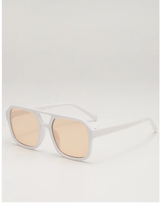 Detail view of double bridge square sunglasses with white frames and amber lenses
