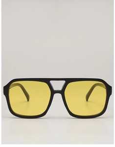 Detail of square pilot sunglasses with thick black frames and yellow tinted lenses