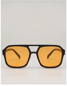 Close-up of black double-bridge square sunglasses with vibrant orange tinted lenses