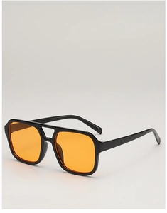 Detail of oversized square sunglasses with double-bridge frame and orange lenses
