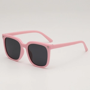 Pink square frame kids sunglasses with silver star studs and dark tinted lenses