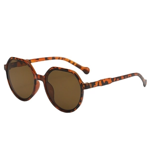 Stylish round tortoiseshell sunglasses with dark brown lenses and UV protection