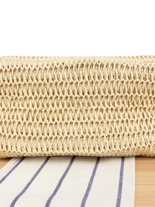 Large beige woven beach bag with premium textured crochet pattern for summer vacations