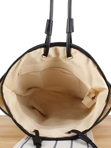 Handwoven large capacity tote bag with black leather handles and spacious interior