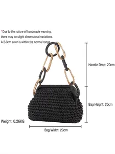 Handmade black woven straw handbag with gold chain strap for beach vacations and casual use