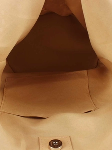 Internal view of woven tote bag with magnetic snap closure and fabric lining
