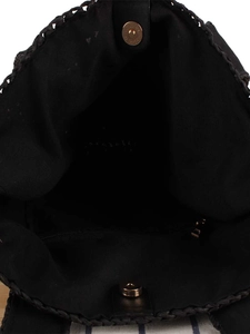 Handwoven black tote bag featuring inner lining, gold magnetic clasp, and zipper pocket