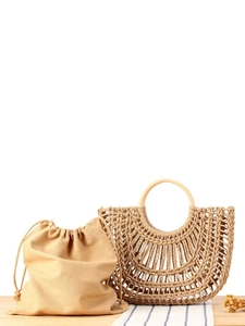 Handcrafted woven straw tote bag with solid wood handles and canvas drawstring lining