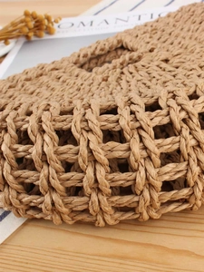 Chic woven straw handbag for women in tan mesh texture with a rustic romantic vibe