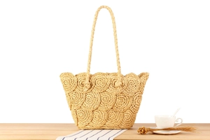 Close-up of handmade woven tote bag featuring unique overlapping circular texture patterns