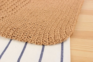 Détail macro du motif en corde de coton tissé kaki avec une texture crochetée dense
