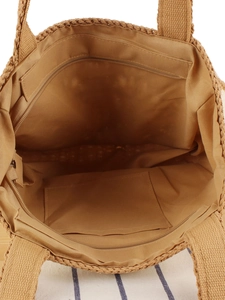 Handmade brown crochet tote bag featuring zipper closure and interior pocket for vacation
