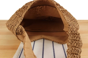 Top view of handmade woven tote bag showing spacious fabric lining and interior zip pocket