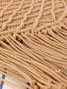 Handmade bohemian macrame woven bag with khaki cotton fringe and diamond pattern