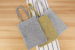 Three-piece set of woven crochet bags in metallic gold and silver for summer beach trips
