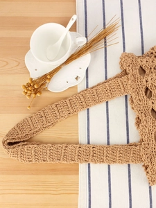 Handmade woven tote bag for beach vacation with natural wood color crochet texture