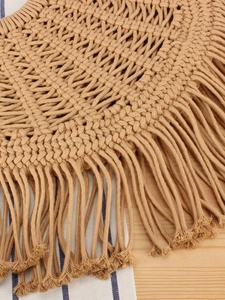 Handwoven cotton rope tote bag with bohemian fringes and geometric knit for vacation