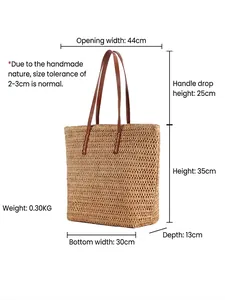 Handwoven straw tote bag with brown leather handles and detailed product size specifications